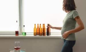 Pregnant woman drinking alcohol