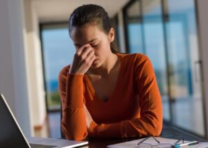 A woman facing alcoholic fatty liver disease.